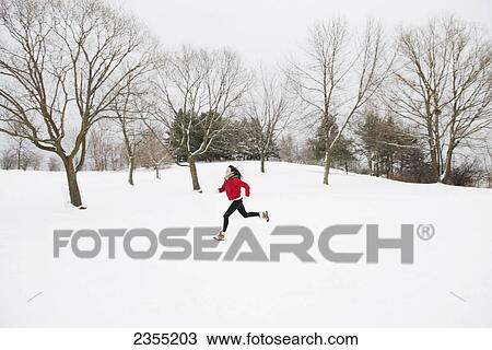 Girl In Red Ski Jacket Running Through Snow Field; Toronto, Ontario, Canada View Large Photo Image Stock Image - Girl In Red Ski Jacket Running Through Snow Field; Toronto, Ontario, Canada. Fotosearch