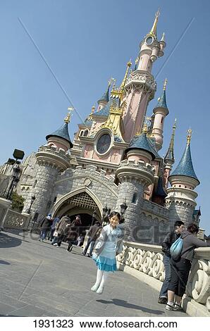 Girl Leaping For Joy In Front Of Sleeping Beauty Castle, Fantasyland, Disneyland, Paris, France; Paris, France View Large Photo Image Stock Image - Girl Leaping For Joy In Front Of Sleeping Beauty Castle, Fantasyland, Disneyland, Paris, France; Paris, France. Fotosearch