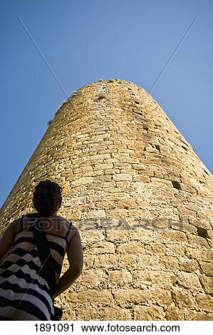 Girl Looking At Castle Tower In Medieval Village View Large Photo Image Stock Image - Girl Looking At Castle Tower In Medieval Village. Fotosearch