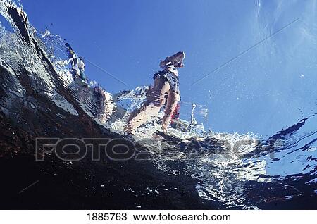 Girl On Diveboat Stern From Underwater View Large Photo Image Stock Image - Girl On Diveboat Stern From Underwater. Fotosearch