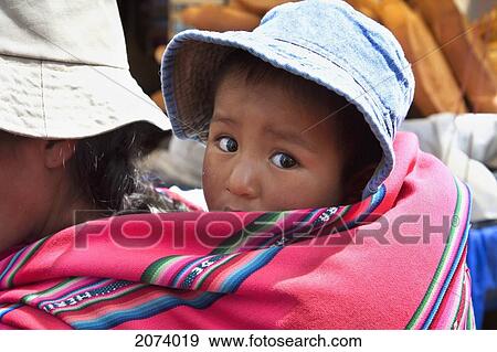 Girl On Her Mother's Back, La Paz, Bolivia View Large Photo Image Stock Photo - Girl On Her Mother's Back, La Paz, Bolivia. Fotosearch