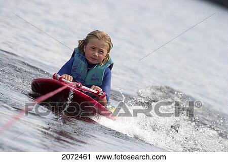 Girl On Knee Board, Ontario View Large Photo Image Stock Image - Girl On Knee Board, Ontario. Fotosearch