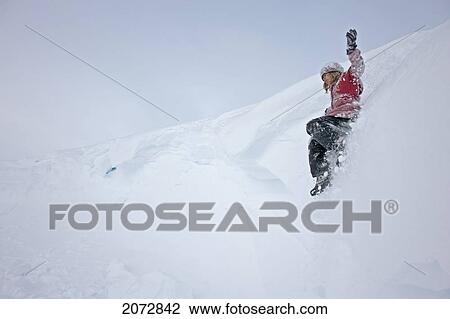 Girl Sliding In Snow, Haines Summit, British Columbia View Large Photo Image Stock Image - Girl Sliding In Snow, Haines Summit, British Columbia. Fotosearch