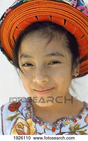 Stock Image - Girl Wearing Local Head-Dress, Santiago. Fotosearch