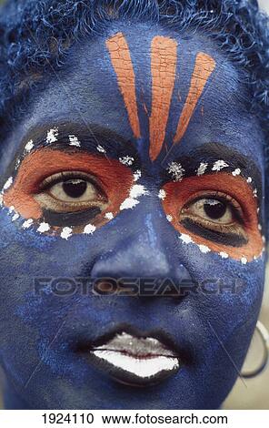 Stock Image - Girl With Blue Painted Face. Fotosearch
