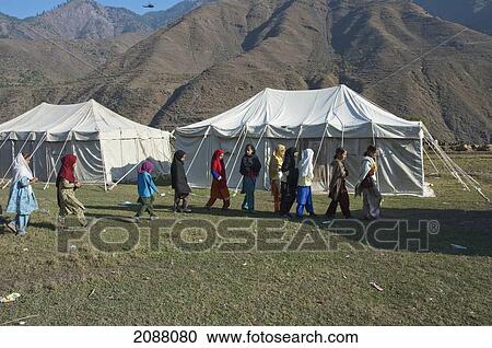 Stock Image - Girls At A School In Tents Donated By China After The 8 October 2005 Earthquake, Chakothi, Azad Kashmir, Pakistan. Fotosearch