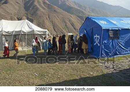 Stock Photo - Girls At A School In Tents Donated By China After The 8 October 2005 Earthquake, Chakothi, Azad Kashmir, Pakistan. Fotosearch