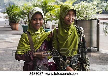 Girls at the Istiqlal Mosque (Independence Mosque), Jakarta, Java Island, Indonesia View Large Photo Image Stock Photo - Girls at the Istiqlal Mosque (Independence Mosque), Jakarta, Java Island, Indonesia. Fotosearch