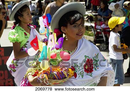 Girls Carrying Festive Baskets In The Entrada De Comadritas Parade During The Carnaval Chapaco, Tarija, Bolivia View Large Photo Image Stock Photo - Girls Carrying Festive Baskets In The Entrada De Comadritas Parade During The Carnaval Chapaco, Tarija, Bolivia. Fotosearch