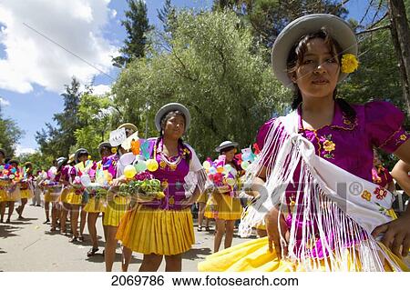 Girls Carrying Festive Baskets In The Entrada De Comadritas Parade During The Carnaval Chapaco, Tarija, Bolivia View Large Photo Image Stock Photograph - Girls Carrying Festive Baskets In The Entrada De Comadritas Parade During The Carnaval Chapaco, Tarija, Bolivia. Fotosearch
