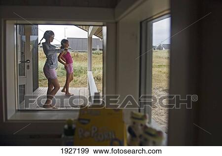 Girls Dancing On Porch, West Jutland, Denmark View Large Photo Image Stock Photo - Girls Dancing On Porch, West Jutland, Denmark. Fotosearch
