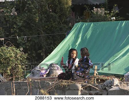 Stock Image - Girls In A Relief Camp After The 8 October 2005 Earthquake, Bagh, Azad Kashmir, Pakistan. Fotosearch