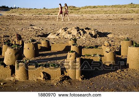 Girls Walking Past Sandcastle View Large Photo Image Stock Image - Girls Walking Past Sandcastle. Fotosearch