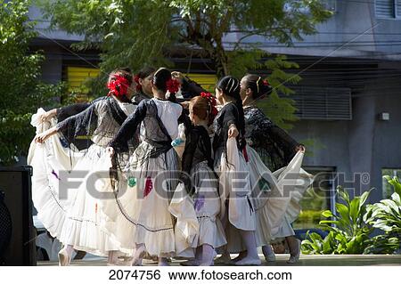 Stock Photograph - Girls Wearing Traditional Dress Performing A Paraguayan Polka, Asuncion, Paraguay. Fotosearch