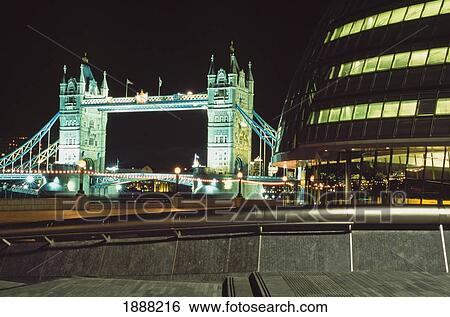 Stock Photograph - Gla Building And Tower Bridge At Night. Fotosearch