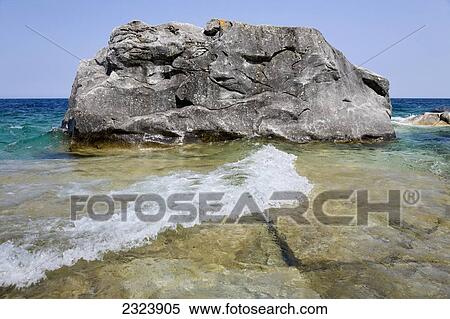 Glacial erratic rock on the shoreline of Bruce Peninsula National Park; Ontario, Canada View Large Photo Image Stock Photography - Glacial erratic rock on the shoreline of Bruce Peninsula National Park; Ontario, Canada. Fotosearch