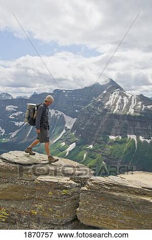 Glacier National Park, Montana, United States Of America; Backpacking Along The Continental Divide View Large Photo Image Stock Photo - Glacier National Park, Montana, United States Of America; Backpacking Along The Continental Divide. Fotosearch