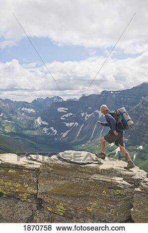 Glacier National Park, Montana, United States Of America; Backpacking Along The Continental Divide View Large Photo Image Stock Photo - Glacier National Park, Montana, United States Of America; Backpacking Along The Continental Divide. Fotosearch