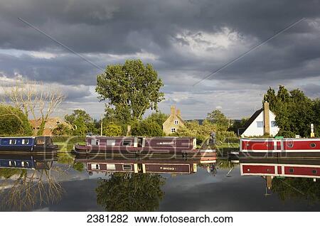 Stock Image - Gloucester and Sharpness canal, near Shepherd's Patch bridge; Slimbridge, Gloucestershire, England. Fotosearch