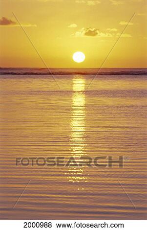 Glowing Sun Ball Over Ocean, Ripples Calm With Reflections Golden Sky View Large Photo Image Stock Photo - Glowing Sun Ball Over Ocean, Ripples Calm With Reflections Golden Sky. Fotosearch