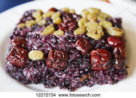 Picture - Glutinous rice with berries and raisins served at the Behai Hotel, Mount Huangshan, Anhui, China. Fotosearch