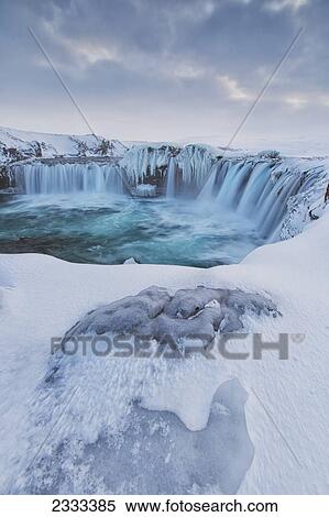 Godafoss With Large Pieces Of Ice Forming In The Cold Weather; Iceland View Large Photo Image Stock Photography - Godafoss With Large Pieces Of Ice Forming In The Cold Weather; Iceland. Fotosearch