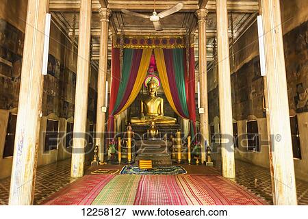 Gold buddha statue in Wat Bo; Siem Reap, Cambodia View Large Photo Image Stock Photo - Gold buddha statue in Wat Bo; Siem Reap, Cambodia. Fotosearch