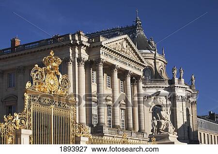 Stock Photo - Gold Gates And An Opera House And Chapel; Paris, France. Fotosearch