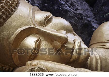 Stock Photograph - Golden Buddha Statue, Close Up. Fotosearch