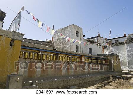 Stock Photo - Golden Prayer Wheels; Lo Manthang, Upper Mustang Valley, Nepal. Fotosearch