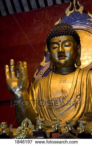 Stock Photo - Golden Statue Of Buddha. Fotosearch