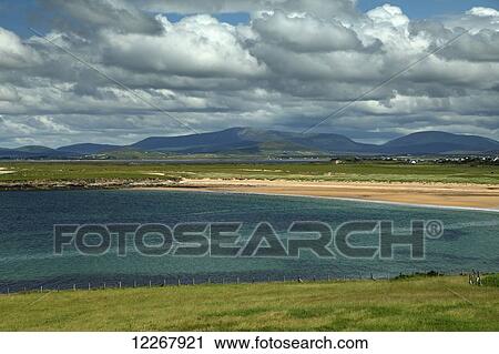 Golden strand on Achill island on the Wild Atlantic Way; County Mayo, Ireland View Large Photo Image Stock Image - Golden strand on Achill island on the Wild Atlantic Way; County Mayo, Ireland. Fotosearch