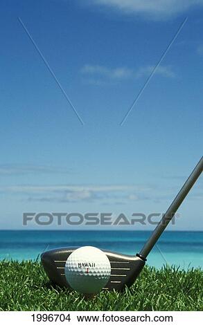 Picture - Golf Ball And Driver, Ocean In Blurred Background. Fotosearch