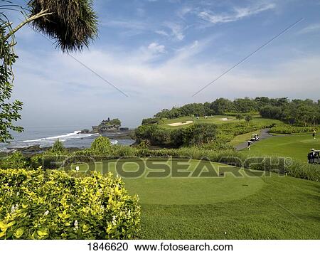 Stock Image - Golf Course By Sea; Bali, Indonesia. Fotosearch