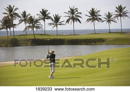 Golfer Playing In Estella Del Mar Golf Country Club, Robert Trent Jone Jr. Championship Course Design; Mazatlan, Sinaloa, Mexico View Large Photo Image Stock Image - Golfer Playing In Estella Del Mar Golf Country Club, Robert Trent Jone Jr. Championship Course Design; Mazatlan, Sinaloa, Mexico. Fotosearch