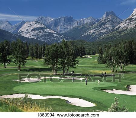 Picture - Golfing In The Rocky Mountains, Kananaskis, Alberta, Canada. Fotosearch