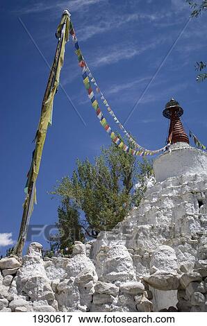 Gomang Stupa festooned with prayer flags in Leh. Leh was the capital of the Himalayan kingdom of Ladakh, now the Leh District in the state of Jammu and Kashmir, India. Leh is at an altitude of 3, 500 meters (11, 483 ft). View Large Photo Image Stock Photo - Gomang Stupa festooned with prayer flags in Leh. Leh was the capital of the Himalayan kingdom of Ladakh, now the Leh District in the state of Jammu and Kashmir, India. Leh is at an altitude of 3, 500 meters (11, 483 ft).. Fotosearch