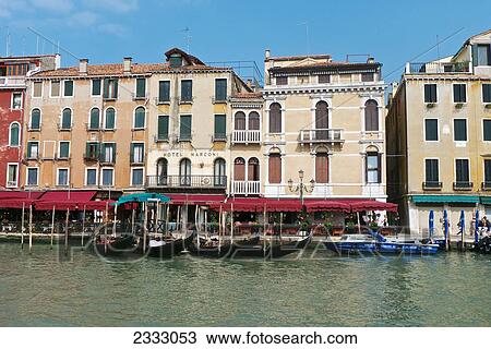 Stock Image - Gondola Station On Grand Canal; Venice, Italy. Fotosearch
