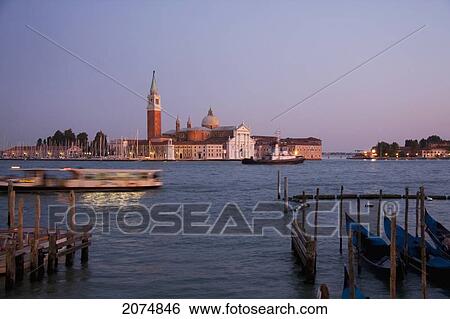 Stock Photograph - Gondolas And Isola Di San Giorgio Maggiore At Dusk, Venice, Italy. Fotosearch