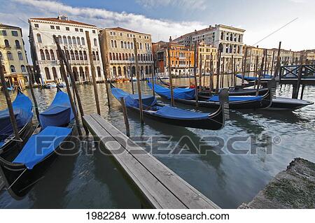 Gondolas Moored On The Grand Canal; Venice Italy View Large Photo Image Picture - Gondolas Moored On The Grand Canal; Venice Italy. Fotosearch