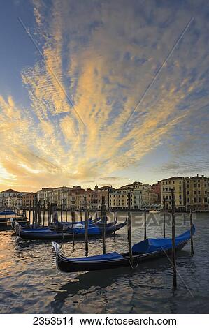 Gondolas Mooring In The Water At Sunrise; Venice, Italy View Large Photo Image Picture - Gondolas Mooring In The Water At Sunrise; Venice, Italy. Fotosearch