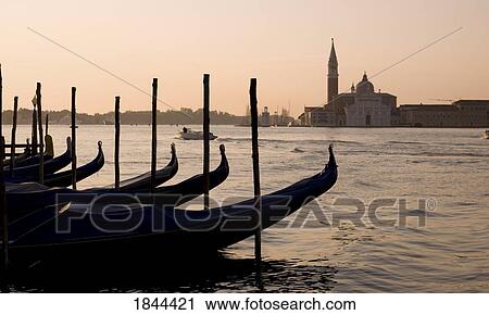 Gondolas On Canal, Church Of St. Giorgio Maggiore In Background; Grand Canal, Venice, Italy View Large Photo Image Stock Image - Gondolas On Canal, Church Of St. Giorgio Maggiore In Background; Grand Canal, Venice, Italy. Fotosearch