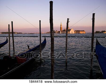 Stock Photo - Gondolas On Canal, Church Of St. Giorgio Maggiore In Background; Grand Canal, Venice, Italy. Fotosearch