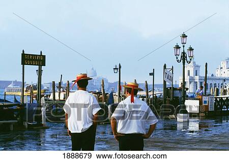 Gondoliers Viewing The Flooding Of The Lagoon View Large Photo Image Stock Photo - Gondoliers Viewing The Flooding Of The Lagoon. Fotosearch