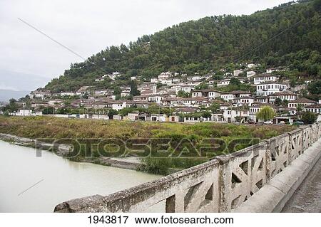 Gorica Bridge (17Th Century) Over The Osumi River And Houses In The Gorica District, Berat, Albania View Large Photo Image Stock Photo - Gorica Bridge (17Th Century) Over The Osumi River And Houses In The Gorica District, Berat, Albania. Fotosearch