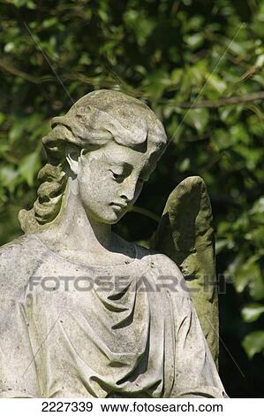 Stock Photo - Gothic Angel Figurehead, The East Cemetery, Highgate, London, England, Uk, Europe. Fotosearch