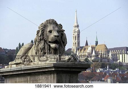 Stock Image - Gothic Matthias Church In Background With Detail Of Lion On Szechenyi Lanchid. Fotosearch