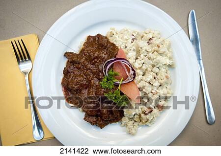 Stock Image - Goulash, A Traditional Dish, In Cool Restaurant Most In Pest, Budapest, Hungary. Fotosearch