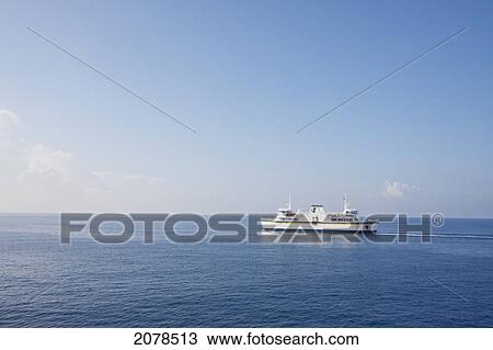 Stock Image - Gozo Channel Line Ferry By Comino Island, Malta. Fotosearch
