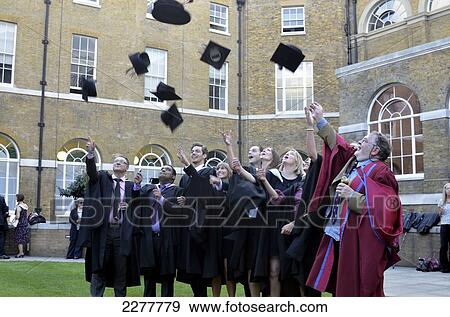 Graduands Throwing Hats In The Air, University College London, London, Uk View Large Photo Image Stock Photo - Graduands Throwing Hats In The Air, University College London, London, Uk. Fotosearch